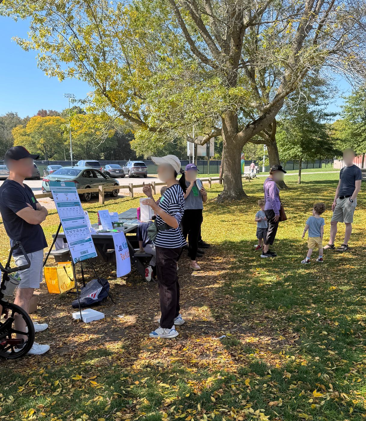 Families at an outdoor playground meetup